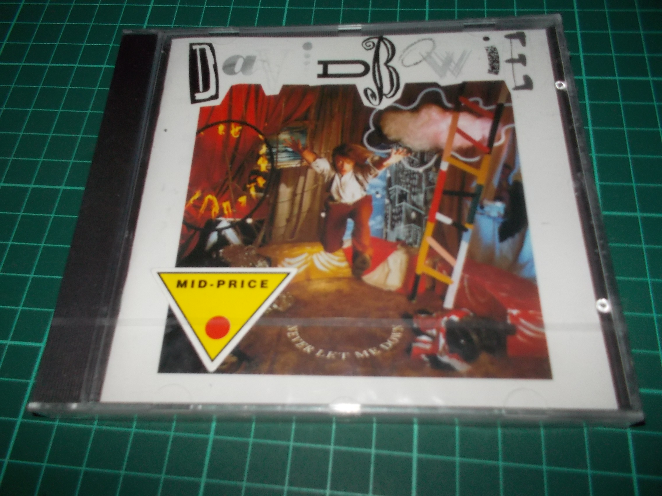 DAVID BOWIE - NEVER LET ME DOWN (CD)