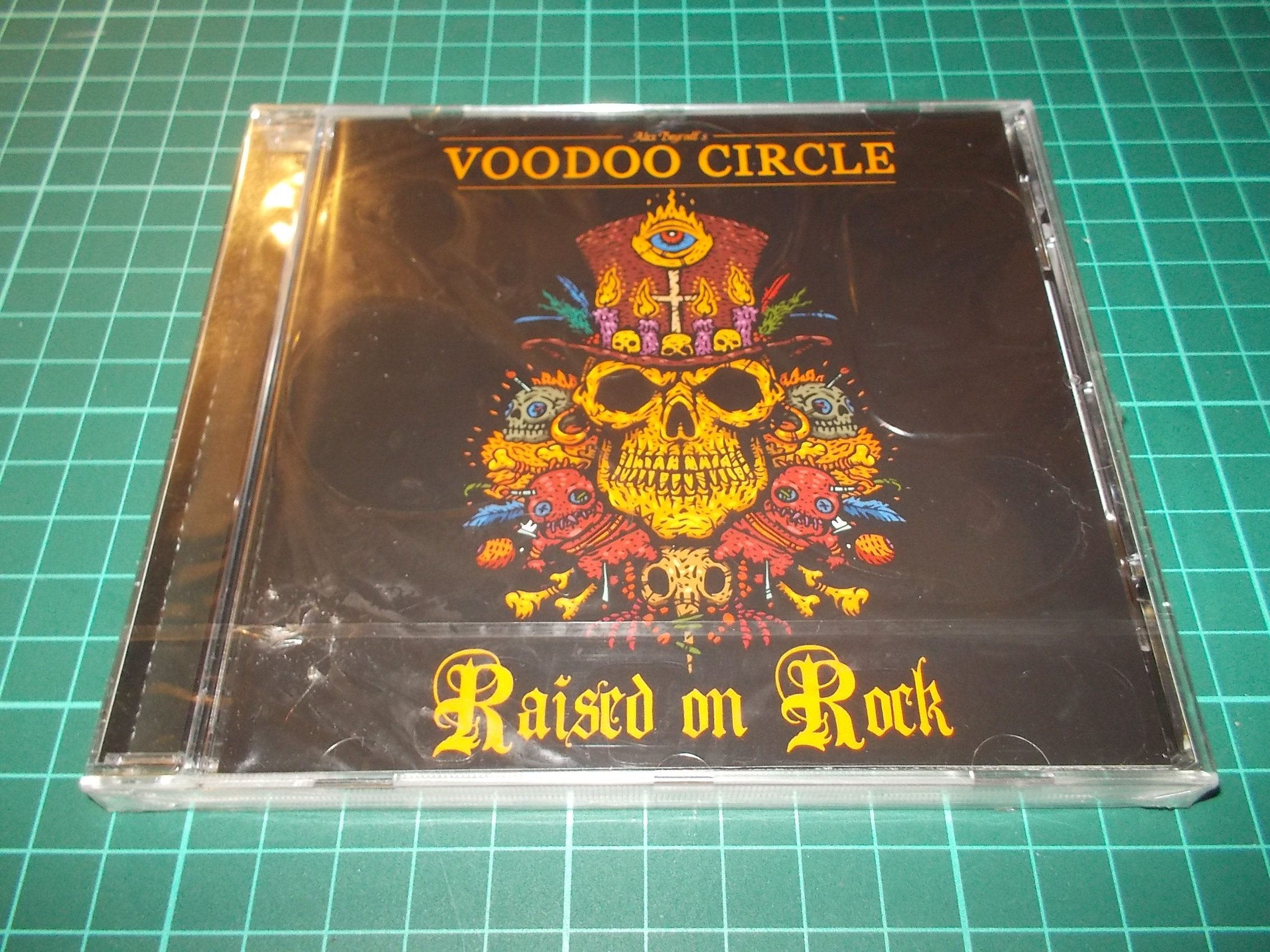 VOODOO CIRCLE - RAISED ON ROCK (CD)