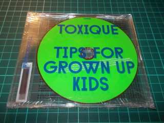 Toxique - Tips For Grown Up Kids (CD)